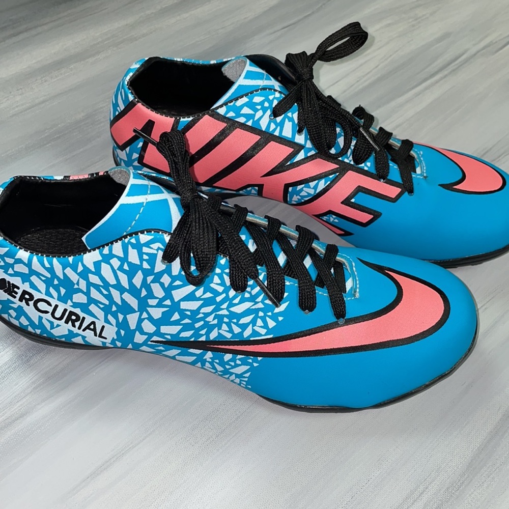 Nike size 6 Mercurial aqua and pink women’s cleats.